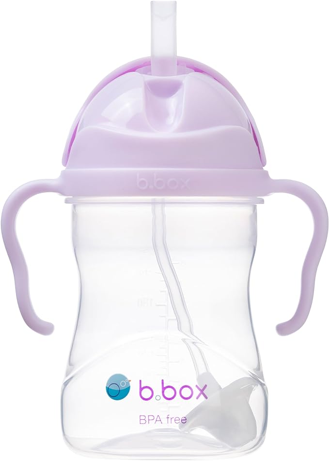 A baby bottle with a strawDescription automatically generated